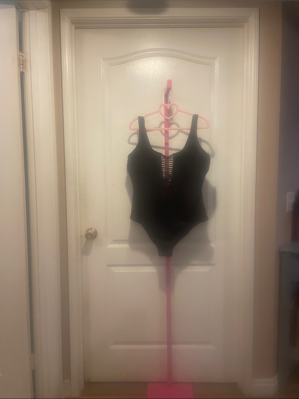 Black One-Piece Women's Swimsuit with Front Ladder Detail